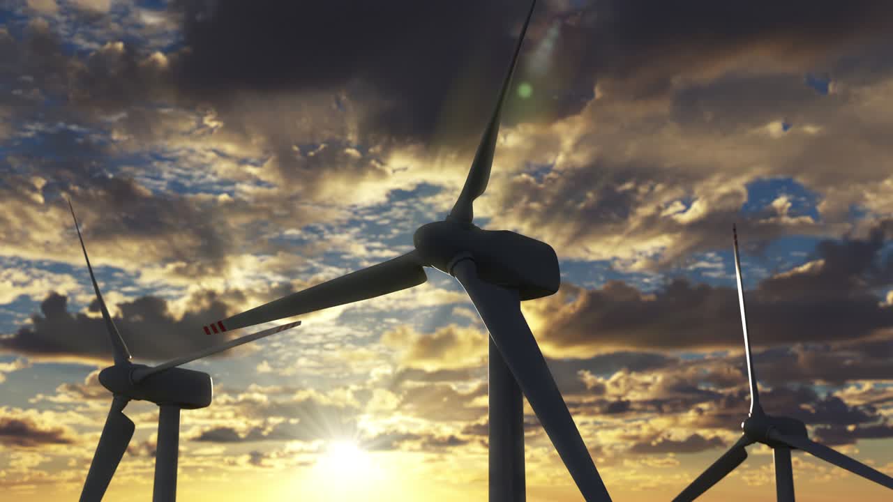 Wind farm with with turbines against sunset skyline