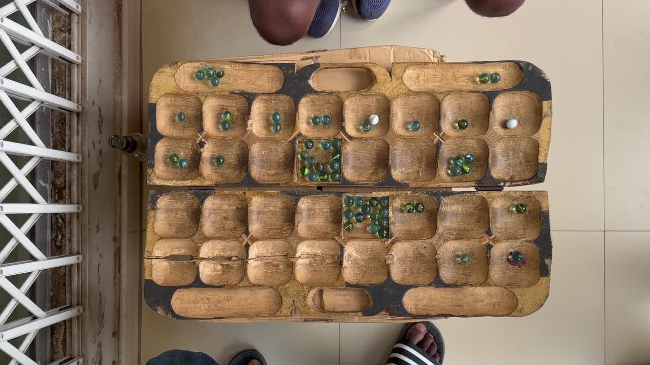 Top down view to the bawo board. Bawo is a traditional Malawian game