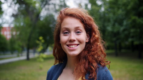 smiling teen girl in park