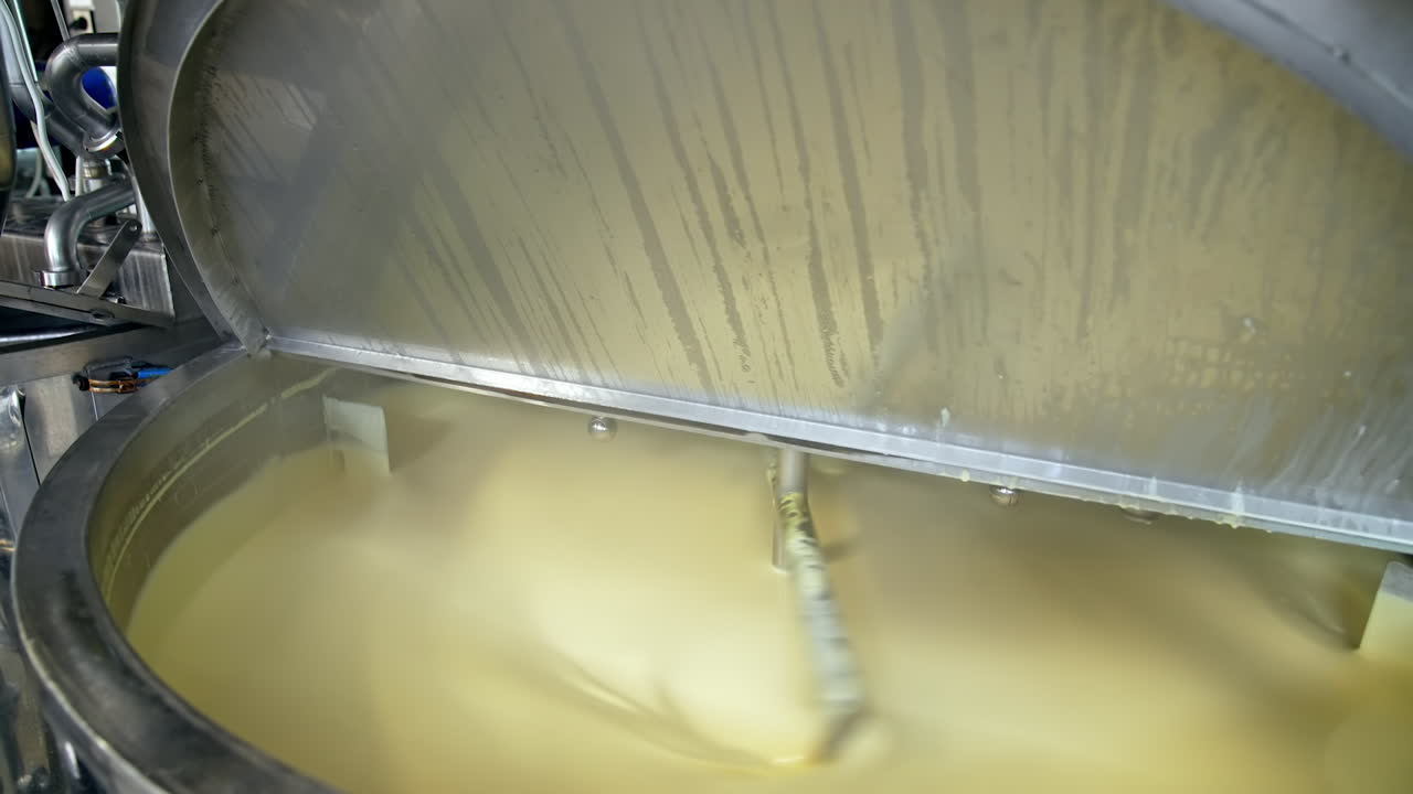 Production of butter at dairy plant. Butter production at dairy food industrial line