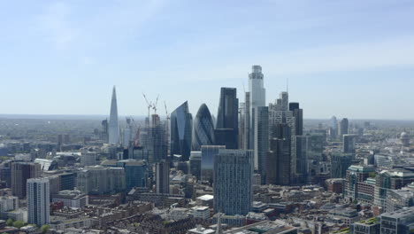 dolly forward drone shot towards city of london skyscrapers