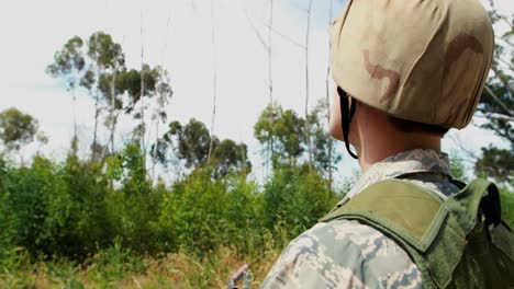 Military-soldier-using-digital-tablet-during-training-exercise