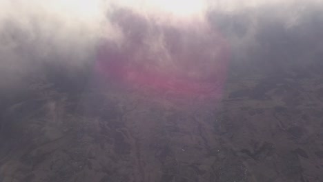 cinematic scene above low altitude clouds in romania