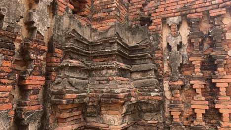 timelapse of deteriorating ancient brick temple wall.