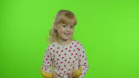 Happy-child-girl-kid-imitating-telephone-conversation-with-banana-isolated-on-chroma-key-background