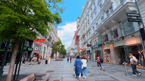 vienna, austria - june 9, 2025: lots of modern shops in the beautiful historical buildings. a tour by the street of vienna, austria