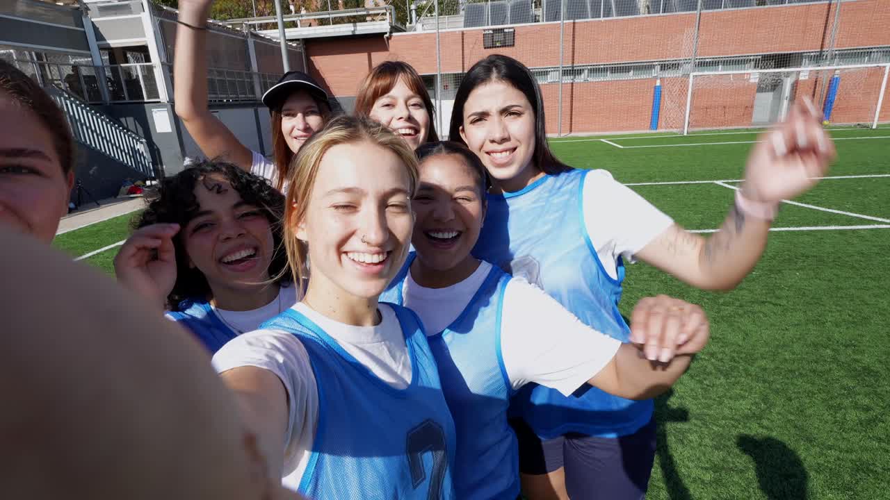 Female Soccer Team Celebrating Victory on Field