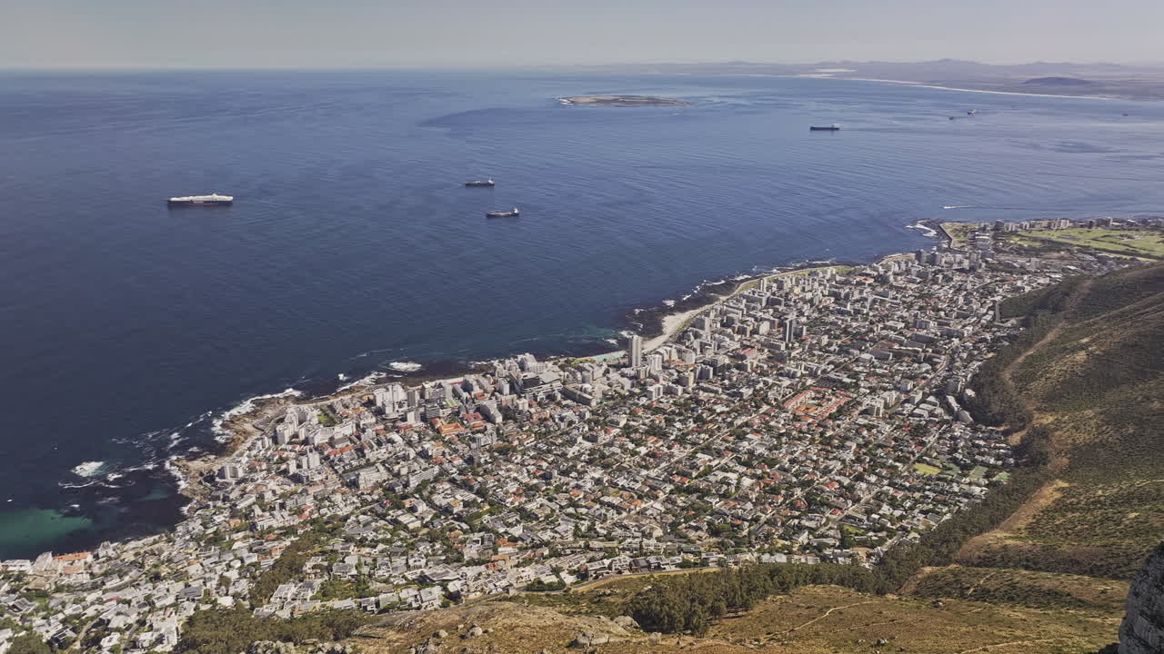 Cape Town South Africa Aerial v34 flyover Signal hill around Lions head capturing sweeping views of mountain landscape, rocky terrain and coastal suburbs - Shot with Mavic 3 Pro Cine - Jan 11th 2024