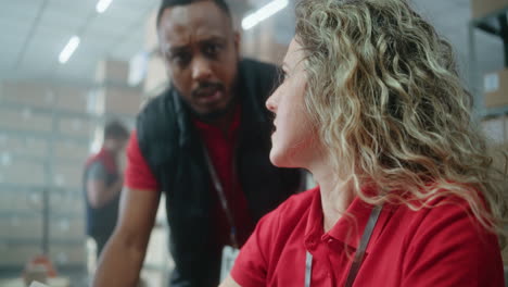 warehouse workers in discussion