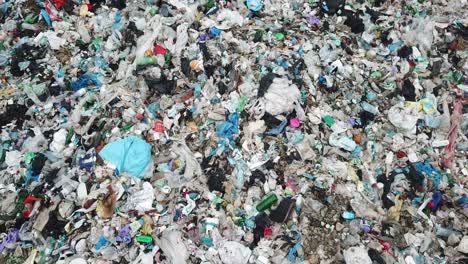 landfill household pile of garbage aerial top view background contamination of the earth with plastic bottles and bags open storage of solid household waste aerial view of birds