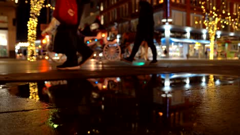 reflection of denver downtown night view on a puddle