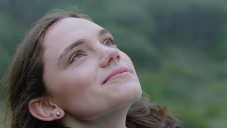 close-up-portrait-of-happy-woman-looking-up-smiling-enjoying-freedom-outdoors-exploring-wanderlust-contemplating-spiritual-journey-in-countryside-breathing-fresh-air-feeling-positive