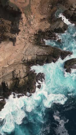 Waves-crashing-against-rocks,-near-Punta-Cometa,-Mazunte,-Oaxaca,-Mexico