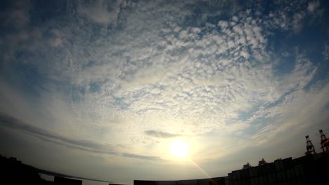 time lapse of a sunrise near the sea port and container yard