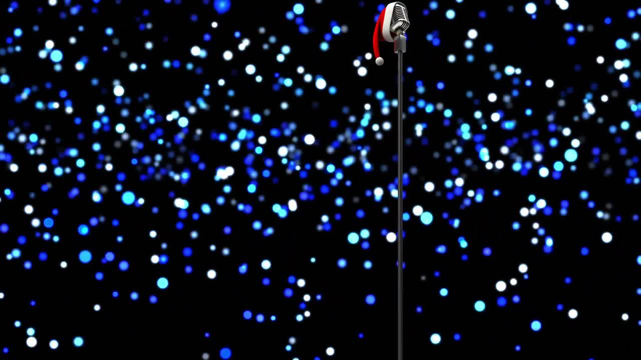 어두운 배경에 크리스마스 모자와 함께 마이크 위에 반 ⁇ 이는 파란 빛의 애니메이션