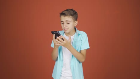 Boy-getting-bad-news-on-the-phone-gets-upset.