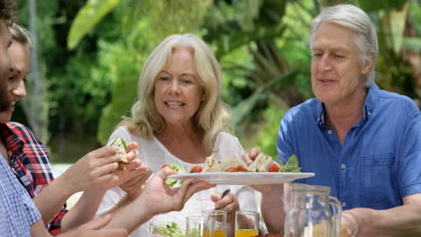 Happy-family-eating-together-