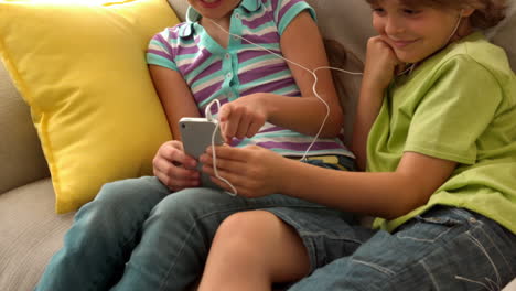 In-slow-motion-two-children-listenning-music