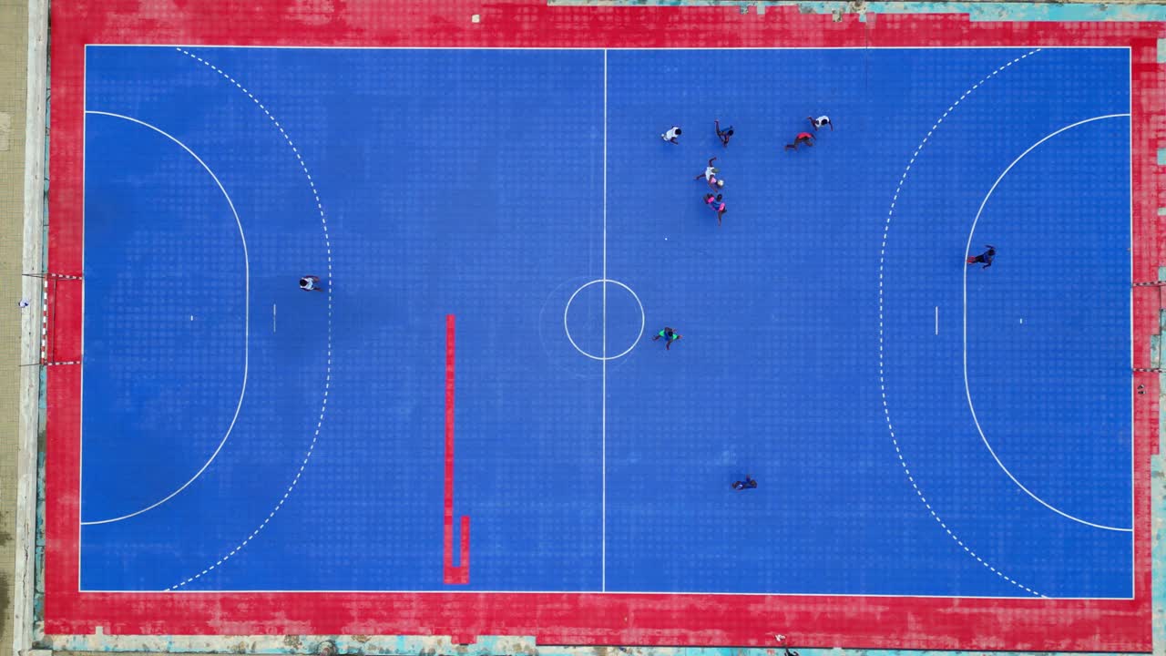 Seen from above young people playing football in São Tomé,Africa
