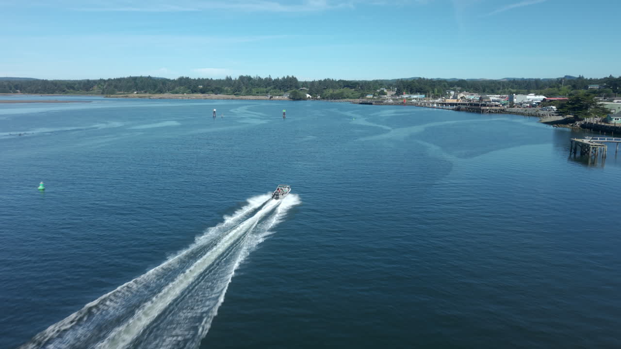 Drone chasing a fishing boat on the Coquille River in Bandon Oregon
