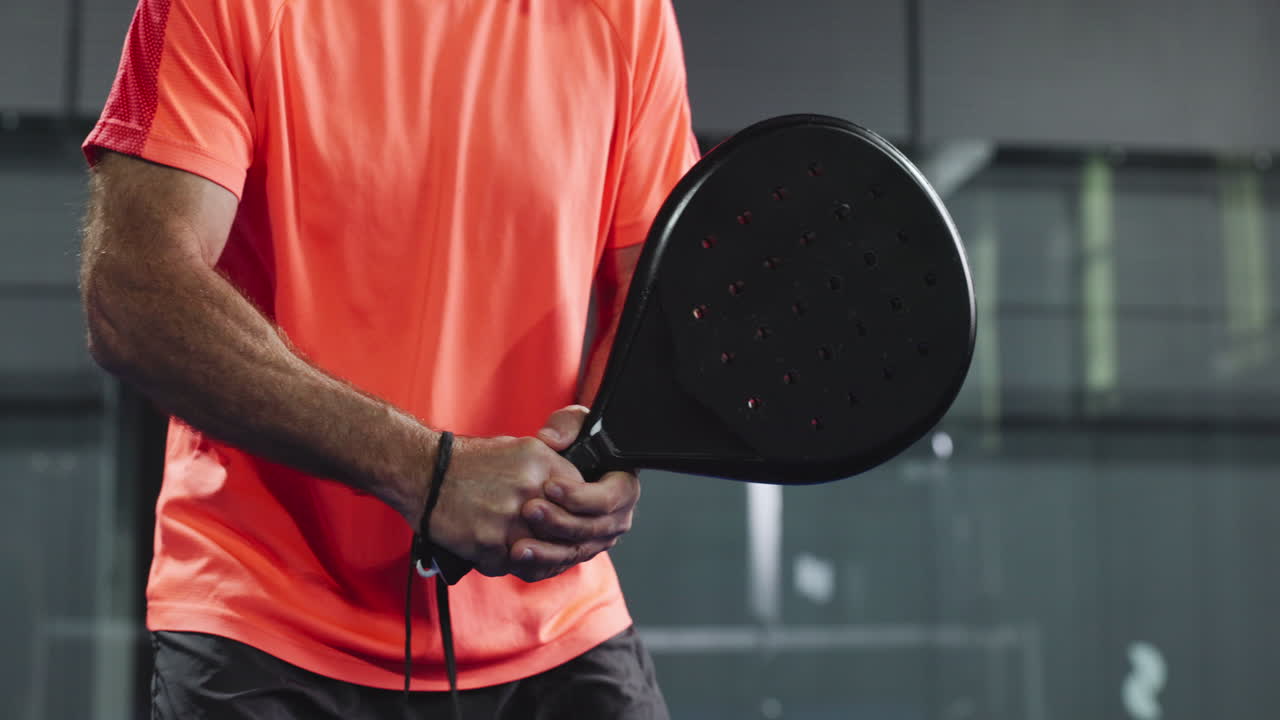 Padel Tennis Player with Racket