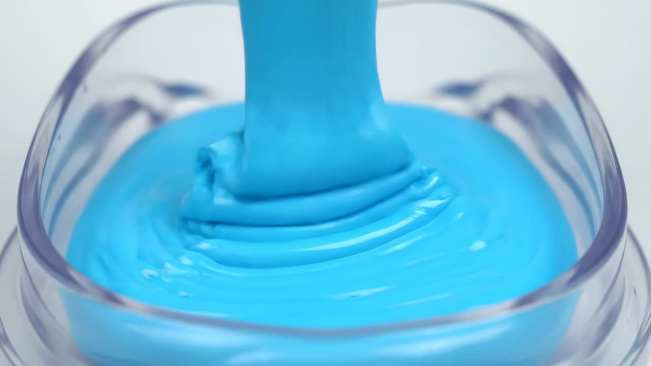 Blue Slime Pouring into Bowl
