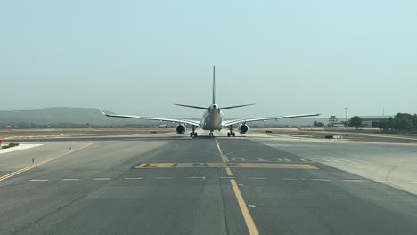 massive airbus 330 recorded from another jet taxiing behind