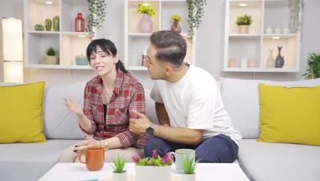 at home, the woman is nervous and her husband calms her down.