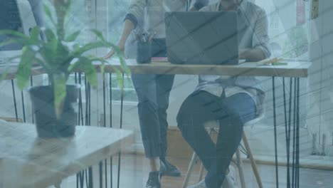 animation of infographic interface, diverse female manager pointing at laptop and explaining to man