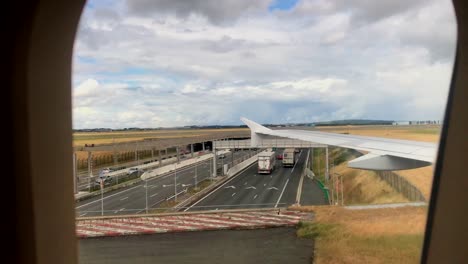 Airplane-driving-near-highway