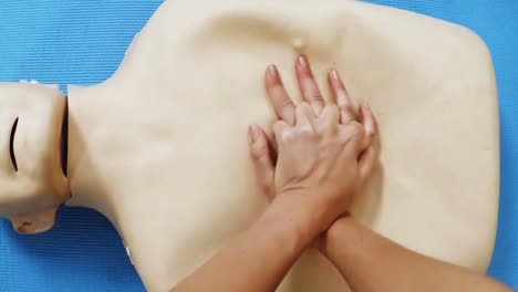 female paramedic during cardiopulmonary resuscitation training