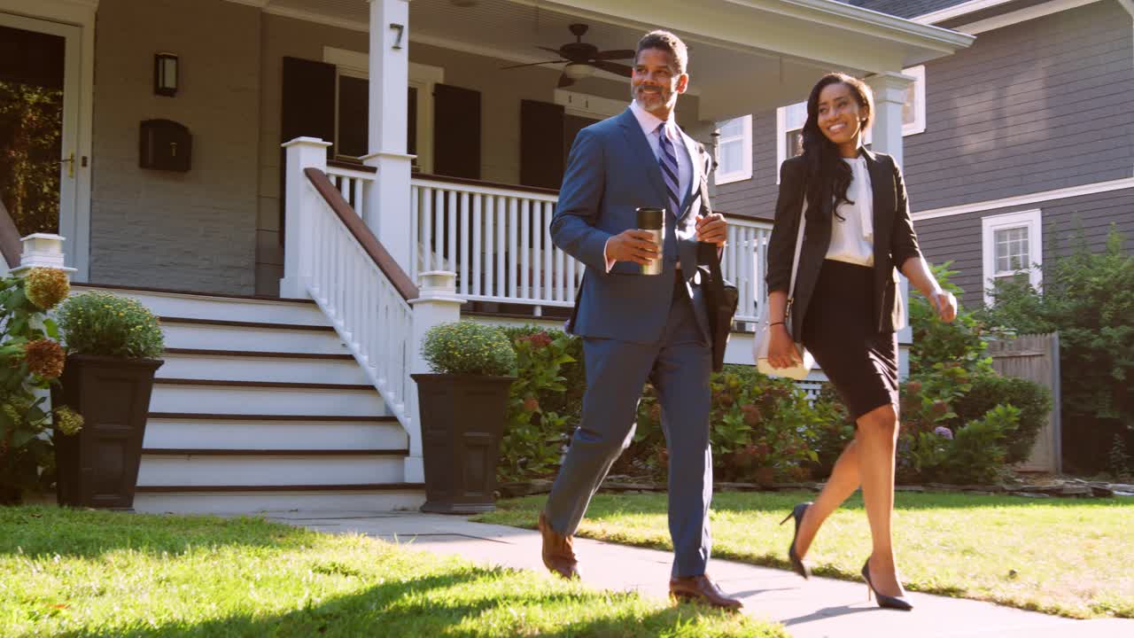 Business Couple With Son Leaving House For Work And School