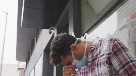 Side-view-of-Caucasian-man-wearing-a-corovirus-covid19-mask-