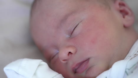 adorable infant sleeps. facial portrait of a cute newborn baby sleeping. healthy children's sleep. infant baby. close-up.