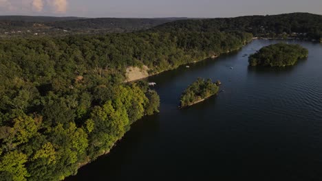 boats in cove on candlewood lake in connecticut, northeast usa during summer season