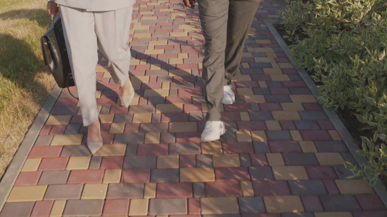 Low Section of Business Couple Walking