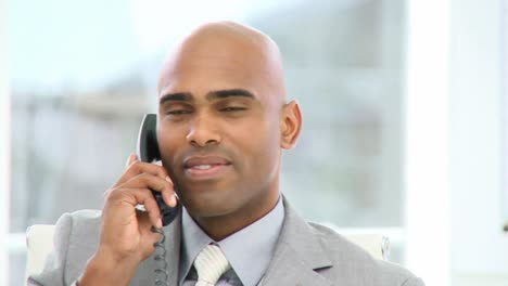 afroamerican businessman on phone