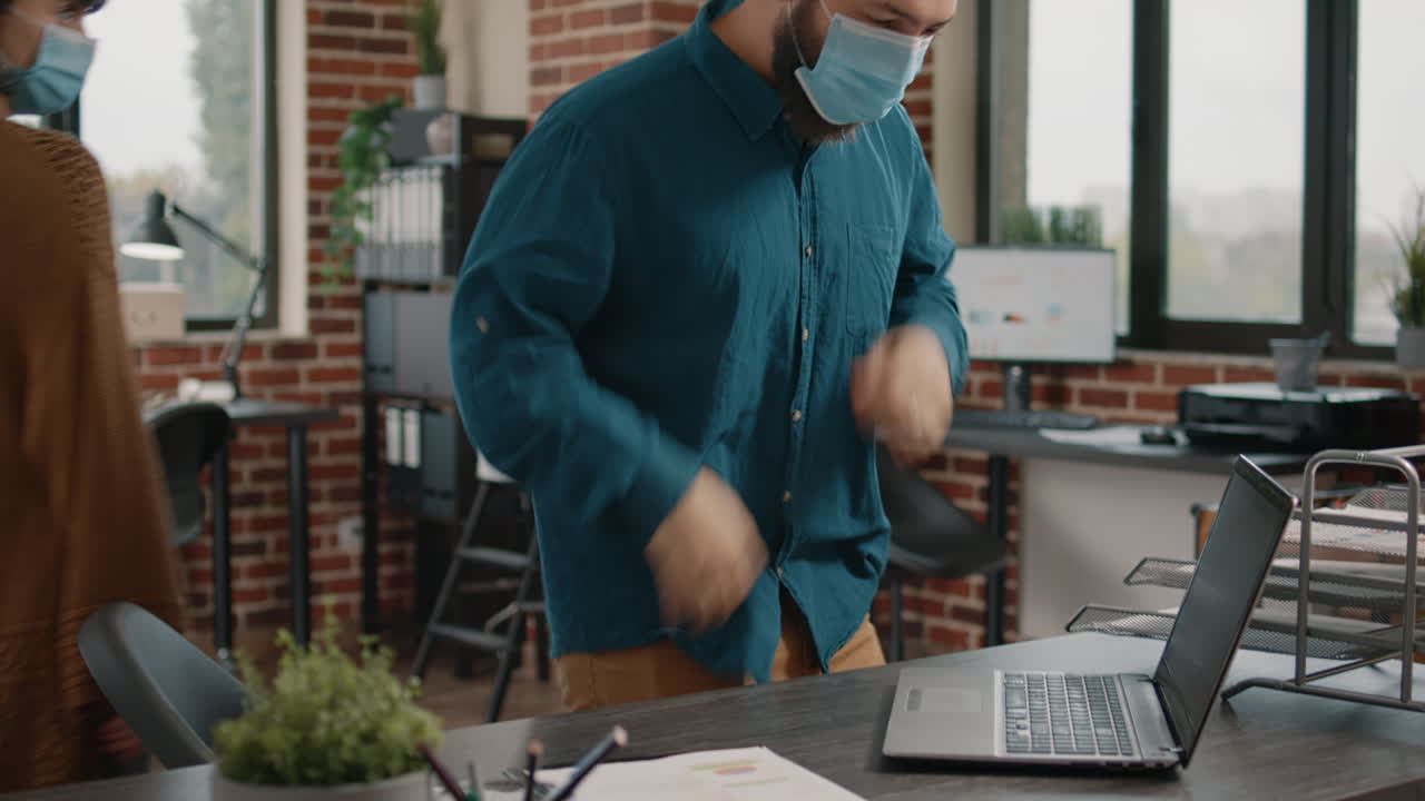Office celebration with face masks during COVID-19