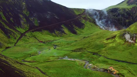 Narrow-Geothermal-River-At-Reykjadalur-Valley,-Popular-For-Bathing-And-Hiking-In-Iceland