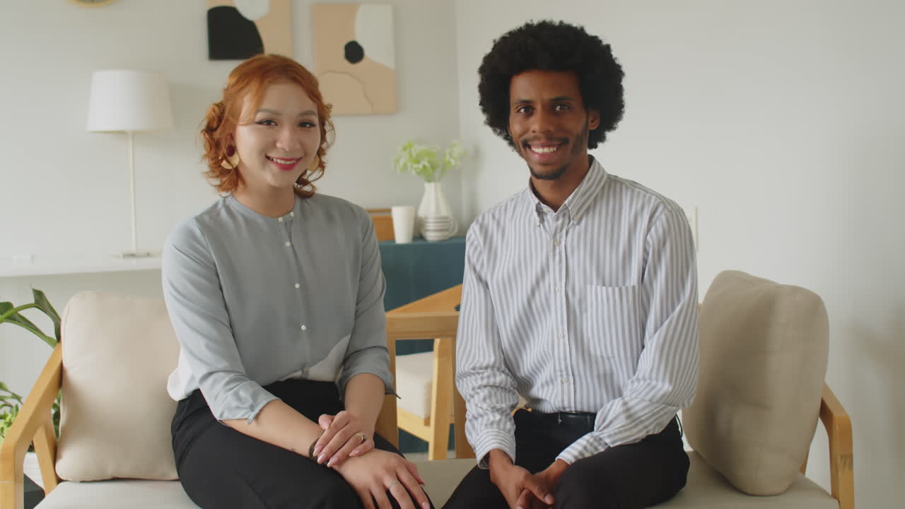 Portrait of Diverse Psychotherapist and Female Client at Consulting Room