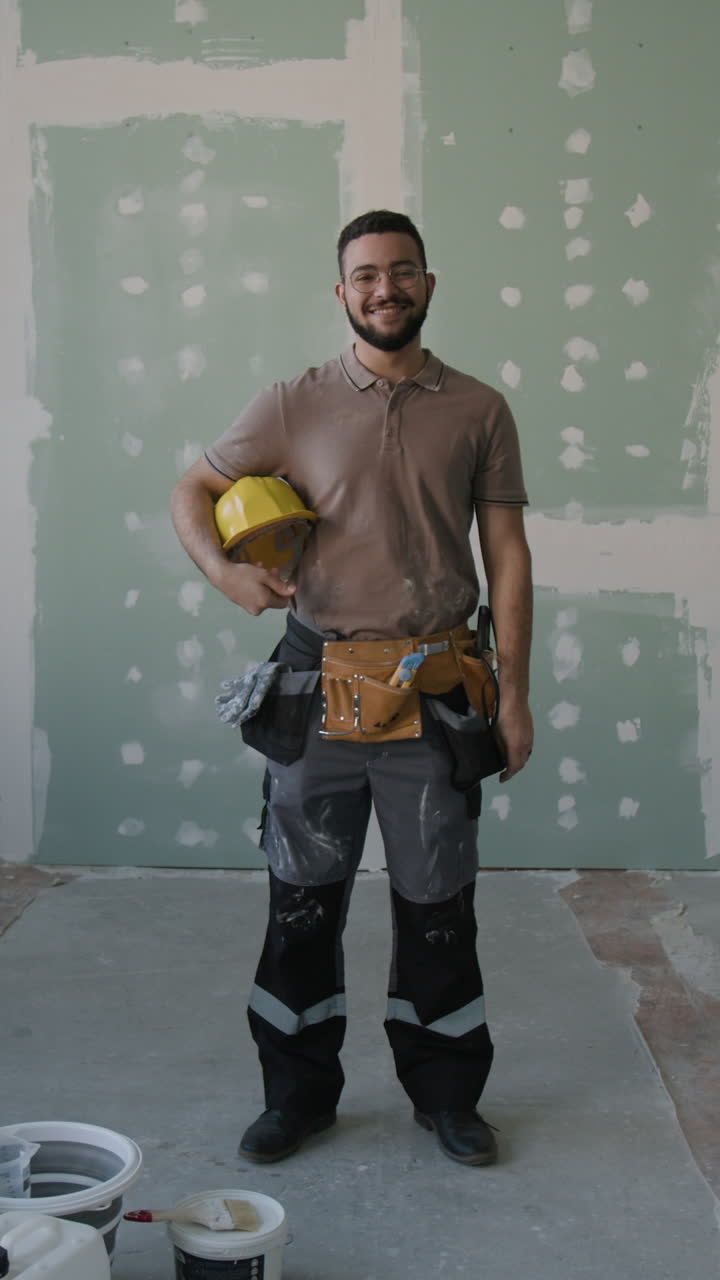 Construction worker wearing a hardhat at a construction site