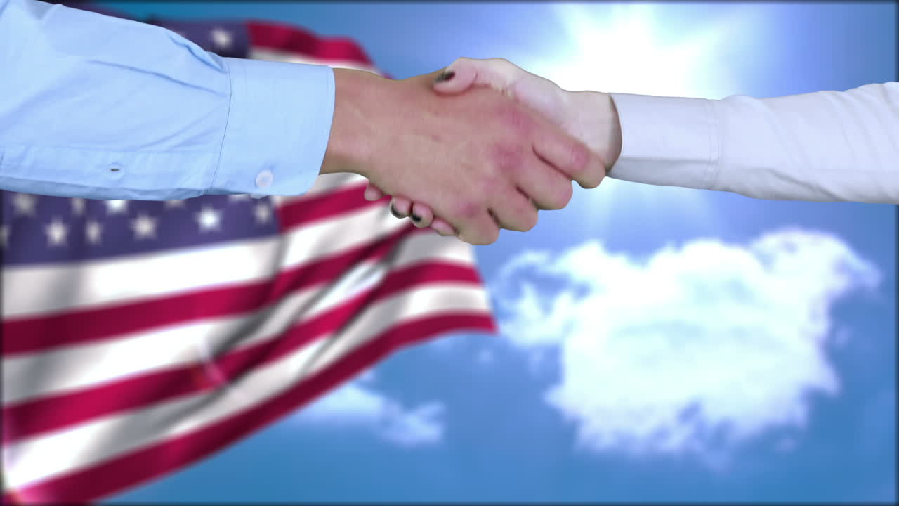 Pessoas de negócios a apertar as mãos.