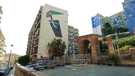 colorful murals on urban buildings in naples