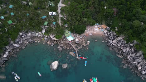 Aerial-over-Ao-Hin-Wong-a-secluded-beach-and-snorkelling-area,-Koh-Pha-Ngan,-Surat-Thani,-Thailand