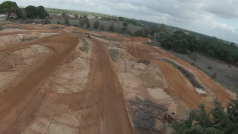 Aerial-overview-of-large-dirt-motocross-track-built-up-in-open-area-in-Portugal