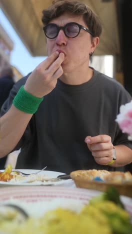 person enjoying outdoor dining experience