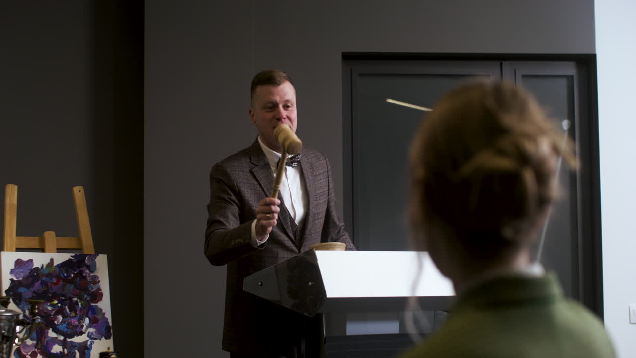 People in an art auction session