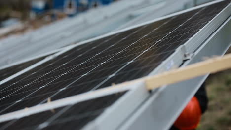alternative energy from nature. vinnitsa, ukraine - november 2017: electrical engineers installing photovoltaic plant in solar power station