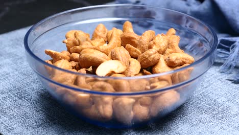 roasted cashews in glass bowl