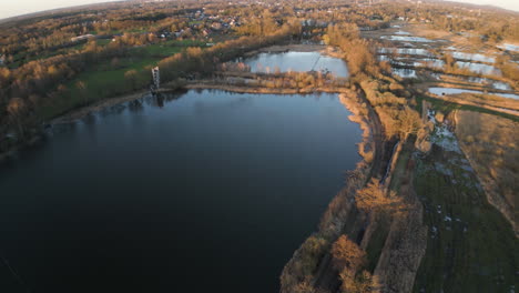 Lake-and-nature-park-in-Belgium,-aerial-drone-view